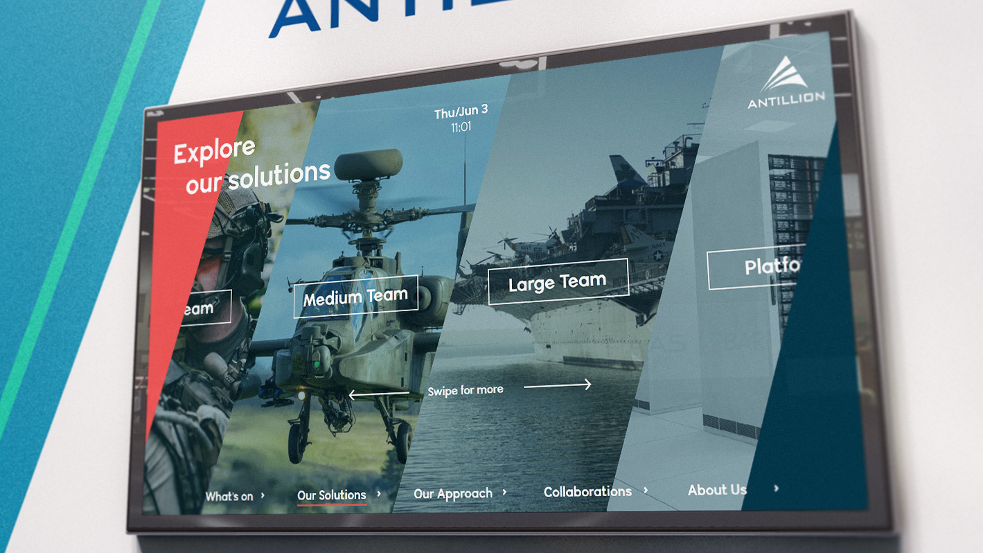 Antillion interactive software displayed on large screen on office wall