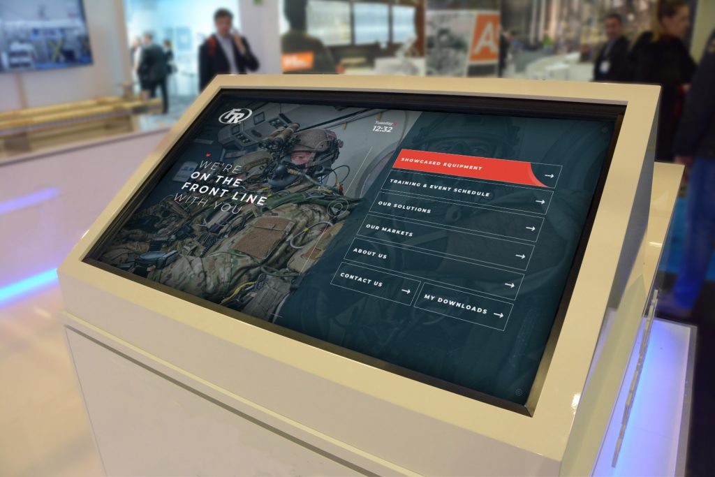 large white monitor showing Federal Response interactive touchscreen presentation